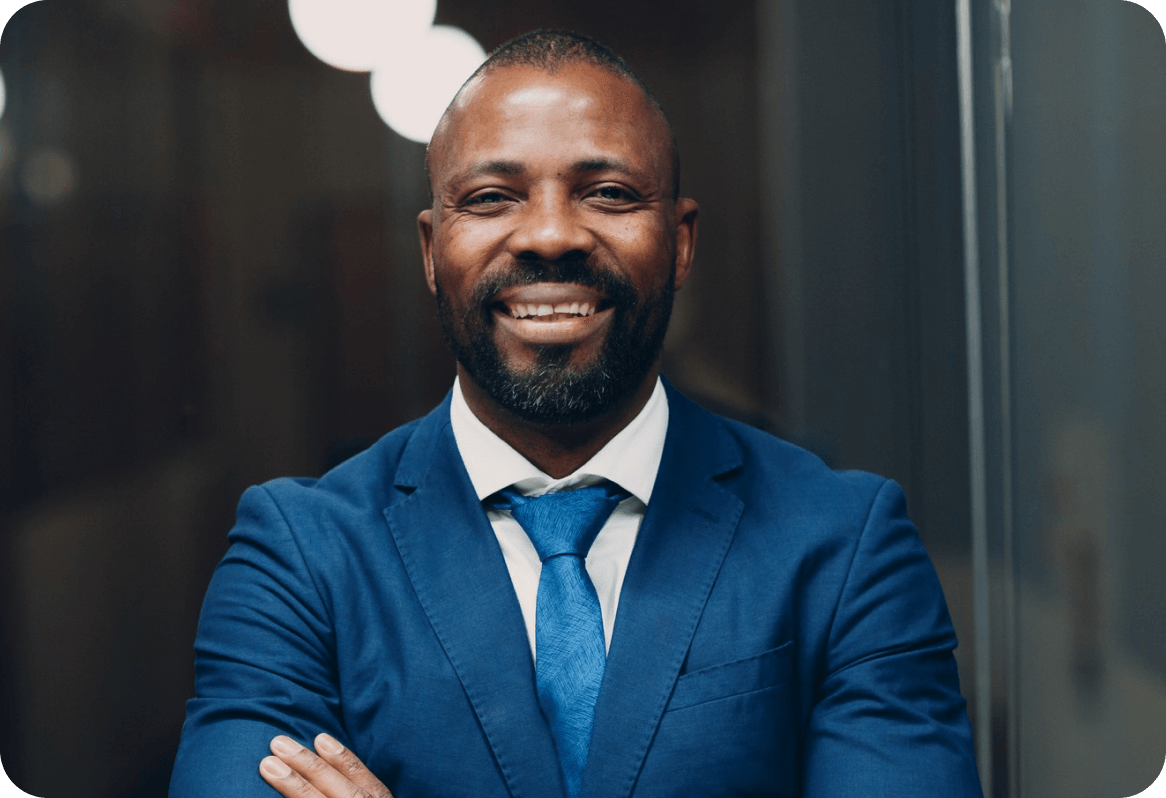 A smiling man in a suit